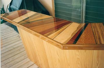 Inlaid exotic wood bar top and durable resin finish